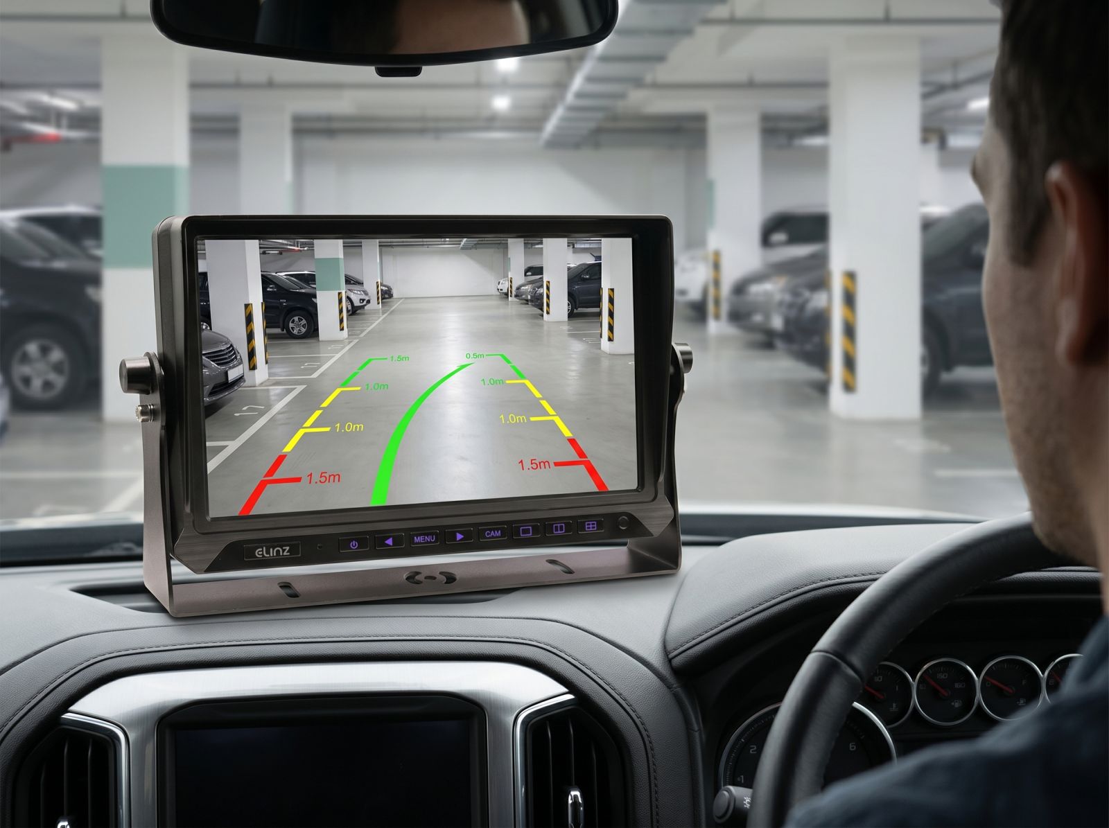 In-car AHD reverse camera monitor showing parking guidelines inside an underground car park