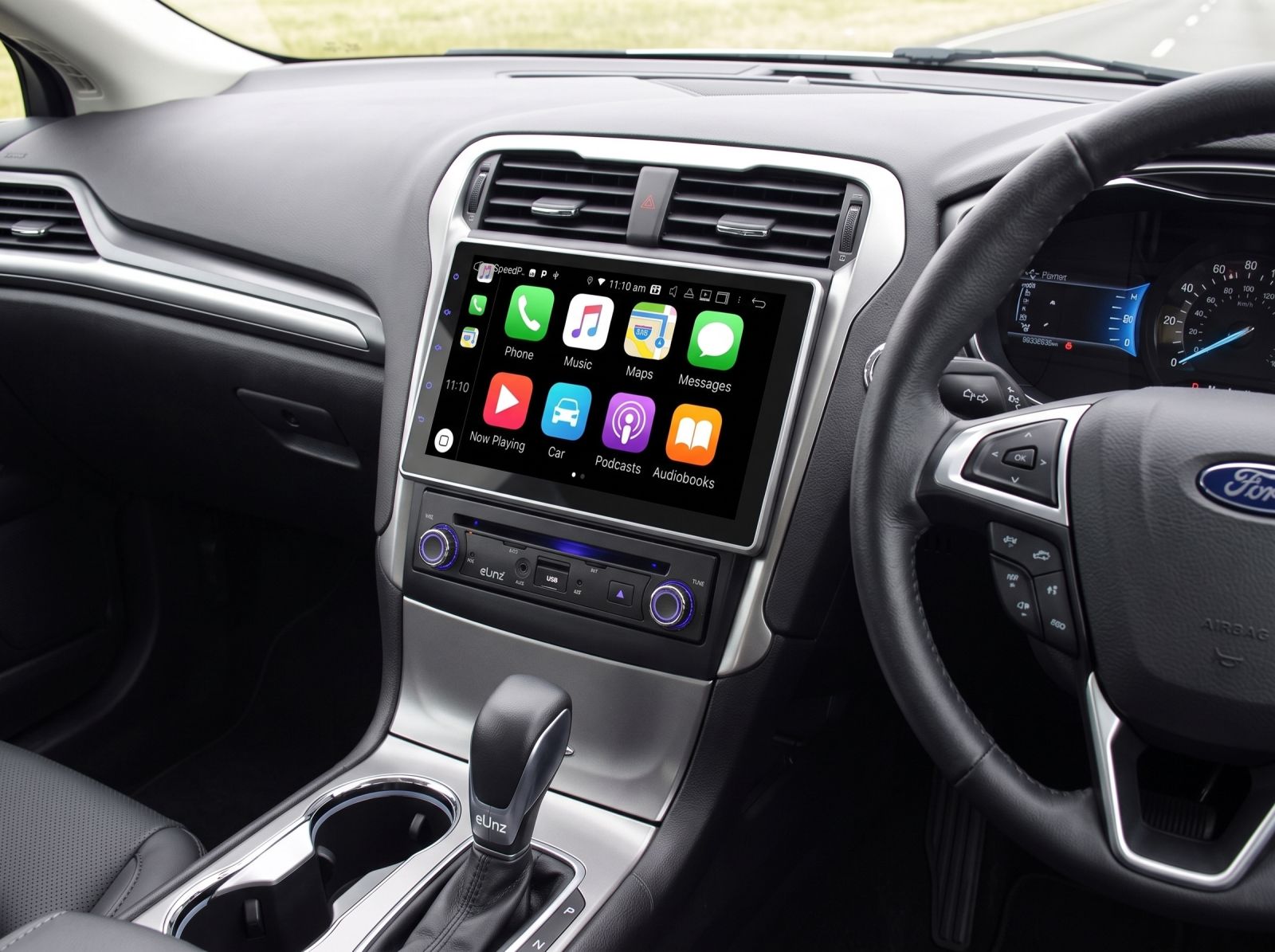 Touchscreen car DVD player head unit installed in a vehicle dashboard with multimedia navigation and smartphone connectivity.