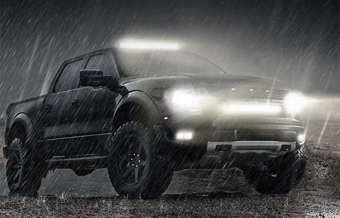 car in rain with led lights