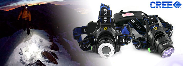 man in snowy mountain wearing led headlamp with caption cree