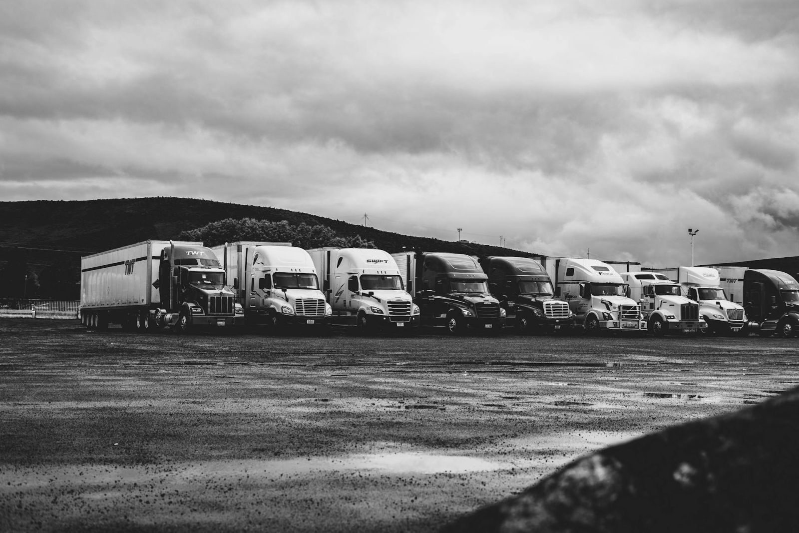 black and white picture of truck fleet